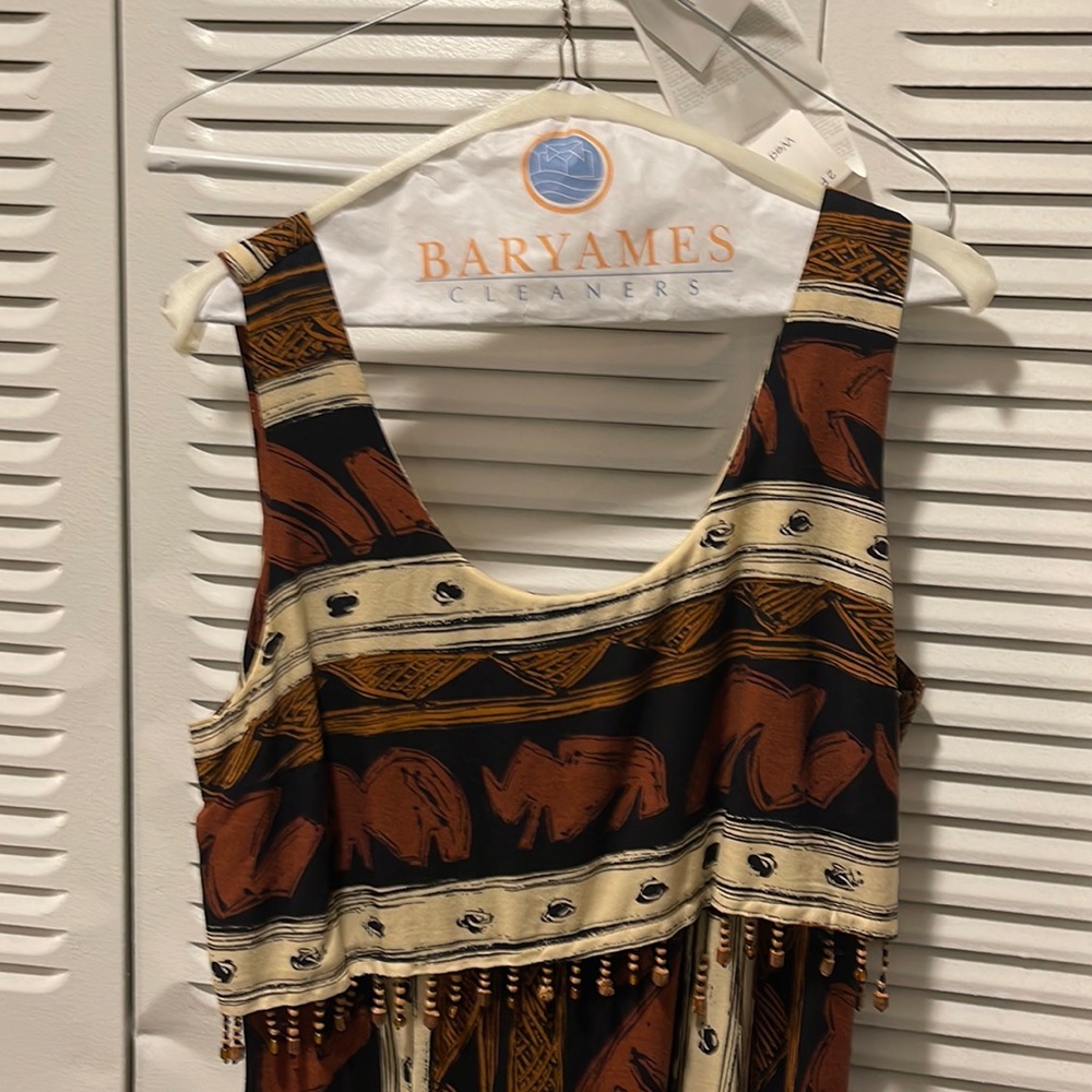 Gorgeous, mid drift dress. The most compliments I have ever received.
